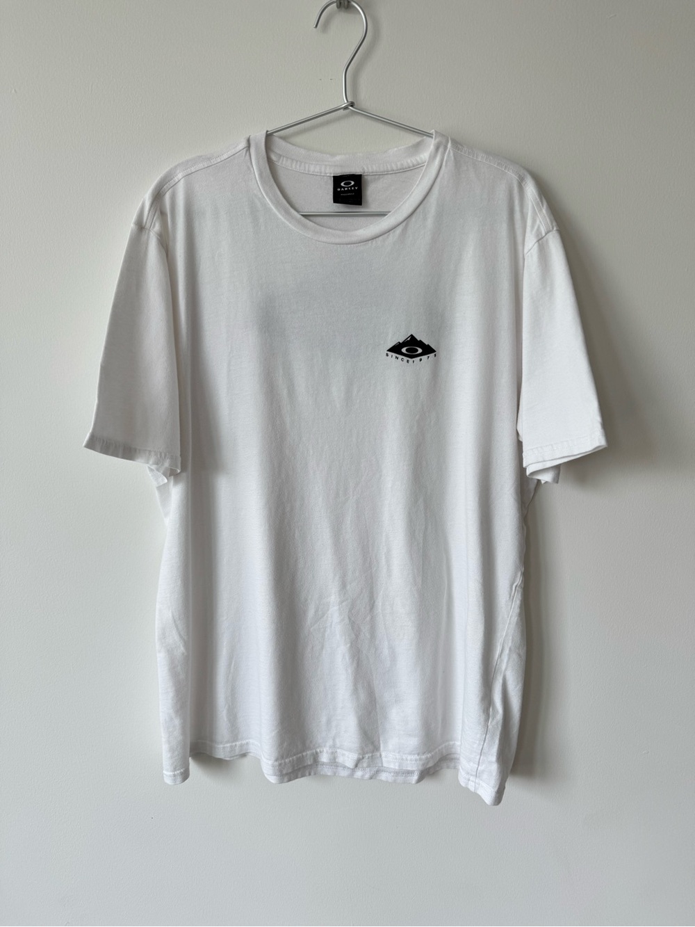 Oakley Men’s White T-Shirt with 1975 Back Graphic - Size L